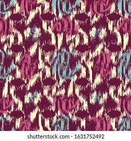 Seamless abstract ikat pattern with the image of floral ornament.
