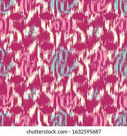 Seamless abstract ikat pattern with the image of floral ornament.
