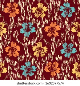 Seamless abstract ikat pattern with the image of floral ornament.
