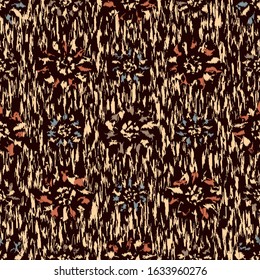 Seamless abstract ikat pattern with the image of floral ornament.
