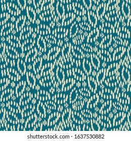 Seamless abstract ikat pattern with the image of floral ornament.
