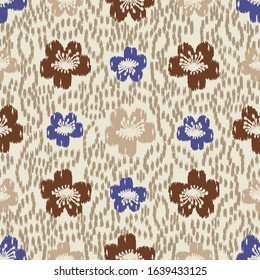 Seamless abstract ikat pattern with the image of floral ornament.
