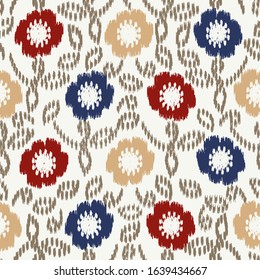 Seamless abstract ikat pattern with the image of floral ornament.
