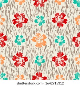Seamless abstract ikat pattern with the image of floral ornament.

