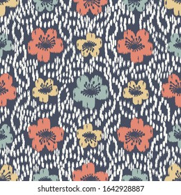 Seamless abstract ikat pattern with the image of floral ornament.
