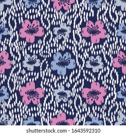 Seamless abstract ikat pattern with the image of floral ornament.
