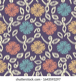 Seamless abstract ikat pattern with the image of floral ornament.
