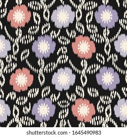 Seamless abstract ikat pattern with the image of floral ornament.
