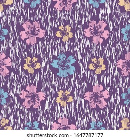 Seamless abstract ikat pattern with the image of floral ornament.
