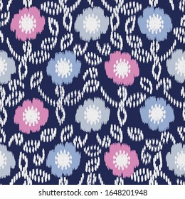 Seamless abstract ikat pattern with the image of floral ornament.
