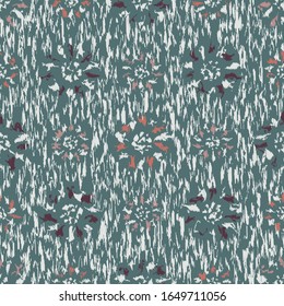 Seamless abstract ikat pattern with the image of floral ornament.
