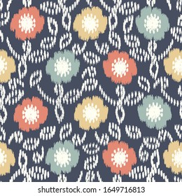 Seamless abstract ikat pattern with the image of floral ornament.
