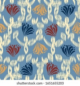 Seamless abstract ikat pattern with the image of floral ornament.
