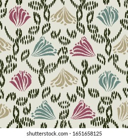 Seamless abstract ikat pattern with the image of floral ornament.
