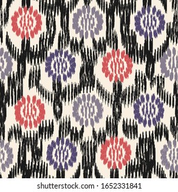 Seamless abstract ikat pattern with the image of floral ornament.
