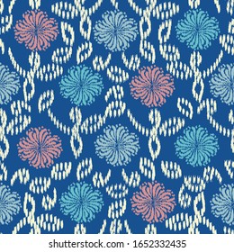 Seamless abstract ikat pattern with the image of floral ornament.
