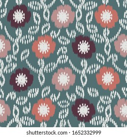 Seamless abstract ikat pattern with the image of floral ornament.
