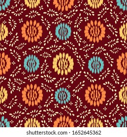 Seamless abstract ikat pattern with the image of floral ornament.
