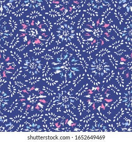 Seamless abstract ikat pattern with the image of floral ornament.

