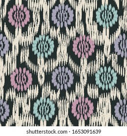Seamless abstract ikat pattern with the image of floral ornament.
