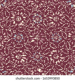 Seamless abstract ikat pattern with the image of floral ornament.

