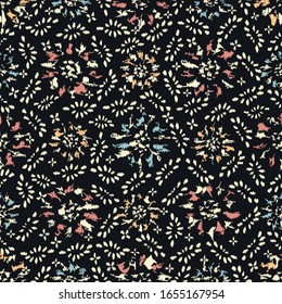 Seamless abstract ikat pattern with the image of floral ornament.
