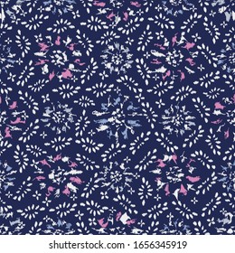 Seamless abstract ikat pattern with the image of floral ornament.
