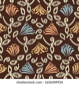 Seamless abstract ikat pattern with the image of floral ornament.
