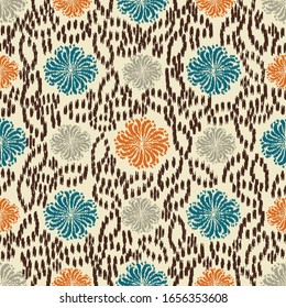 Seamless abstract ikat pattern with the image of floral ornament.
