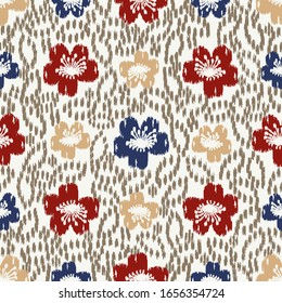 Seamless abstract ikat pattern with the image of floral ornament.
