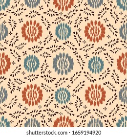 Seamless abstract ikat pattern with the image of floral ornament.

