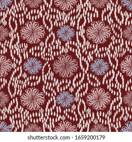 Patrón abstracto de ikat sin inconvenientes con la imagen de adorno floral.
