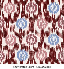 Seamless abstract ikat pattern with the image of floral ornament.
