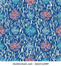 Seamless abstract ikat pattern with the image of floral ornament.
