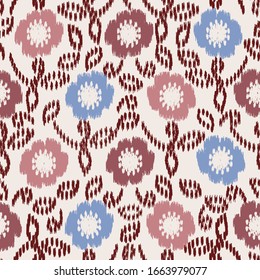 Seamless abstract ikat pattern with the image of floral ornament.

