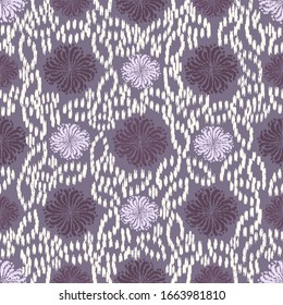Seamless abstract ikat pattern with the image of floral ornament.

