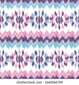 Seamless abstract ikat pattern with the image of floral ornament.
