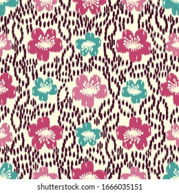 Seamless abstract ikat pattern with the image of floral ornament.
