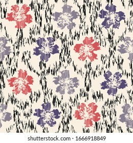 Seamless abstract ikat pattern with the image of floral ornament.

