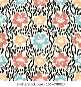 Seamless abstract ikat pattern with the image of floral ornament.
