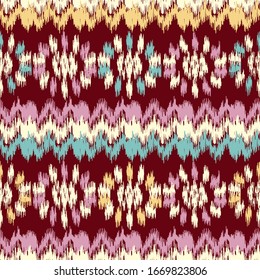 Seamless abstract ikat pattern with the image of floral ornament.
