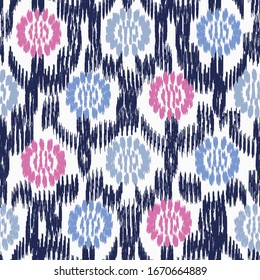 Seamless abstract ikat pattern with the image of floral ornament.
