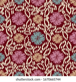 Seamless abstract ikat pattern with the image of floral ornament.
