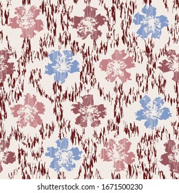 Seamless abstract ikat pattern with the image of floral ornament.
