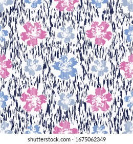 Seamless abstract ikat pattern with the image of floral ornament.
