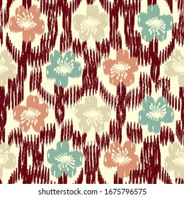 Seamless abstract ikat pattern with the image of floral ornament.
