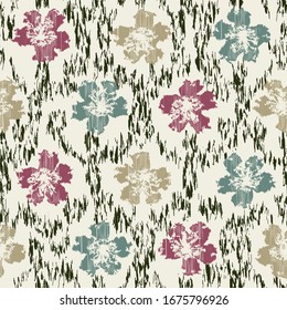 Seamless abstract ikat pattern with the image of floral ornament.

