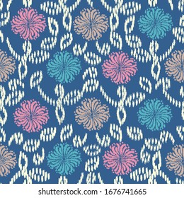 Seamless abstract ikat pattern with the image of floral ornament.
