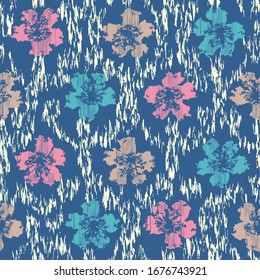 Seamless abstract ikat pattern with the image of floral ornament.
