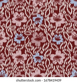 Seamless abstract ikat pattern with the image of floral ornament.
